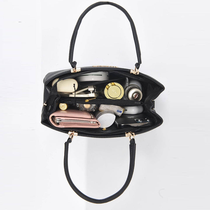 Nirela – Silhouette a Conchiglia con Finitura Spalmata, Borsa a Mano